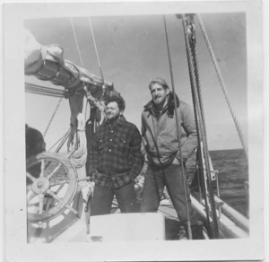 Image of Jim Schwedland and Dick Backus near wheel