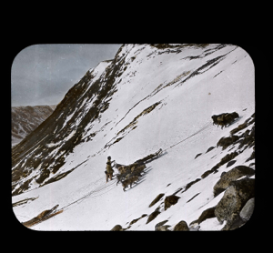 Image of Team climbing up from ice to valley road