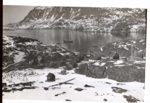 Image: West Greenland village in winter. Schooner moored