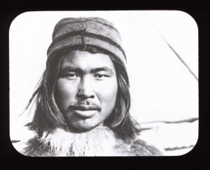 Image of Inuit man in knit cap