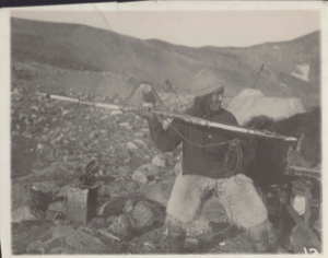 Image of Myah with harpoon, in throwing position