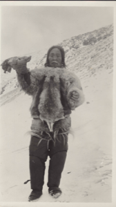 Image of Inuit woman holding  ?