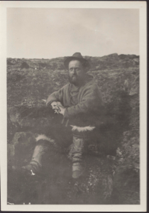 Image: Expedition member sitting on ground (wrong temp id)
