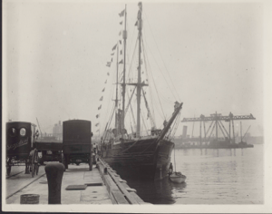 Image: DIANA at the dock. Two horse-drawn wagons on dock, one with 