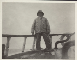 Image of Mate M. Davis on the quarter deck of the "Cluett". Off Disko Island