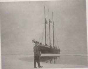 Image of E. O. H. on ice in front of "George B. Cluett"