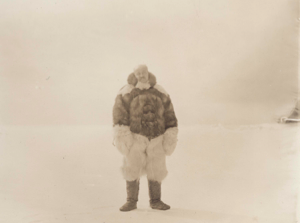 Image of Captain Pickles in furs, on snow