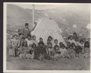 Image: Eskimos [Inuit] at Etah [Large group of Inuit by striped tupik]