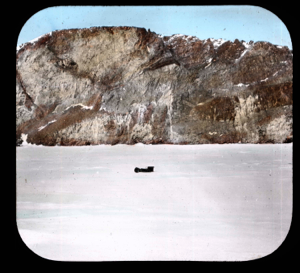 Image of Bird Cliff, north side Parker Snow Bay. Camera equipment on snow