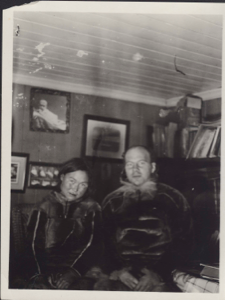 Image of Couple in their living room. Woman is Inuit (wrong temp ID)