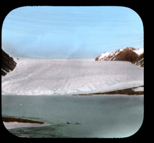 Image of Alida Lake and Brother John's Glacier. Team in foreground