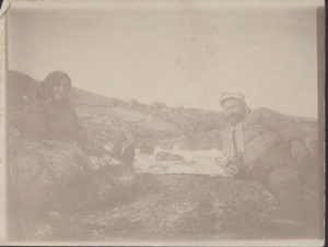 Image of Middle-aged (Danish?) couple at a picnic