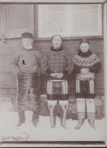 Image: Boy and two girls in traditional West Greenland garb