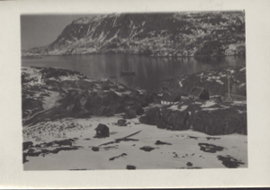Image of West Greenland village and harbor. Vessel moored