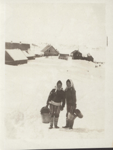 Image of Two West Greenlandic women carrying two pails each