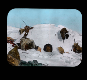 Image of In-u-ge-to's igloo [iglu] with snowshoes and assorted supplieds