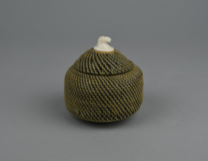 Image of Light baleen basket with walrus head finial