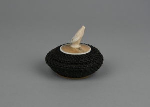 Image: small baleen basket with breaching whale finial on whalebone lid