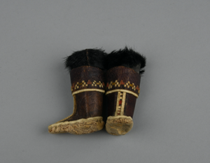 Image: doll's boots decorated with leather mosaic