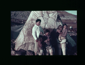 Image: Inuit family standing by tupik  [purple]