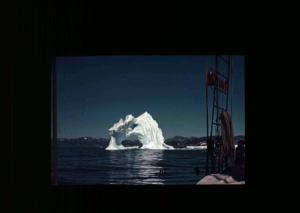 Image of Iceberg with hole seen beyond rigging