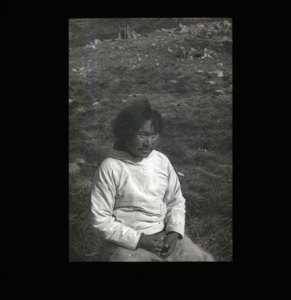 Image of Inuit man sitting  [b&w]