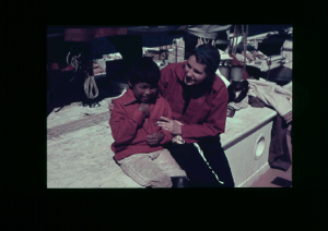Image of Miriam MacMillan and Inuit boy aboard  [purple]