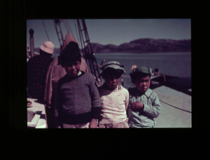 Image of Three inuit children aboard  [purple]