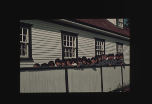 Image: The MacMillan/Moravian school; boys by fence