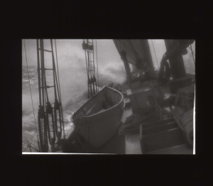 Image of Looking across dories to rough seas  [b&w]