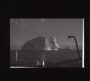 Image of Iceberg seen over rail  [b&w]