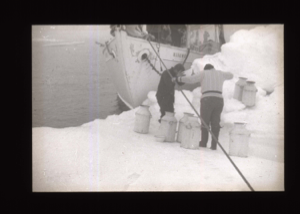 Image of The BOWDOIN against ice floe; crew getting water  [b&w]