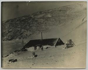 Image of Borup Lodge in winter, side view. Thermometer shelter