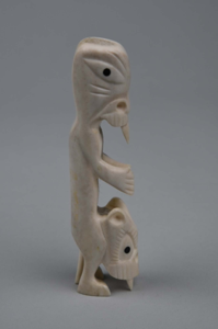 Image: Tupilaq with two fanged heads, feet and arms