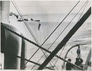 Image of Henry Harrison being hauled to safety on The Great Ice Barrier