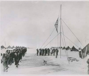 Image of Flag raising ceremony over Little America IV