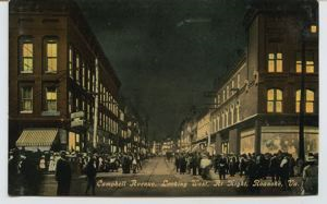 Image: [Crowds on] Campbell Avenue, looking west at night