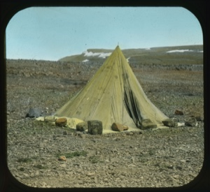 Image of "Our tent where we slept" [Ekblaw and E.O.H.] Weighted with large rocks