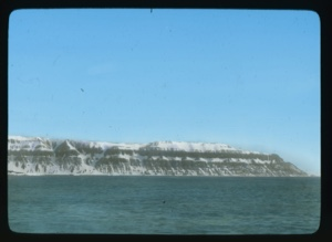 Image: Striated cliffs with snow
