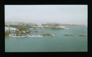 Image of Landscape: Water, low hills, tiny islands