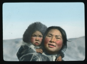 Image of Ah-tee-tah with toddler in hood, on the ERIK