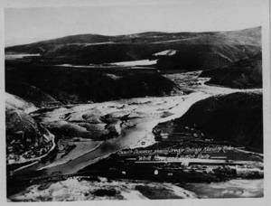 Image of South Dawson, showing dredge trailings, Klondike River. Yukon River Circle Tour