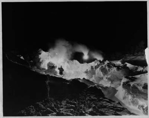 Image: The Byrd Expedition explores pressure ridges at night by magnesium flare