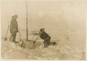 Image of Two men at an instrument station. Soviet Polar Expedition