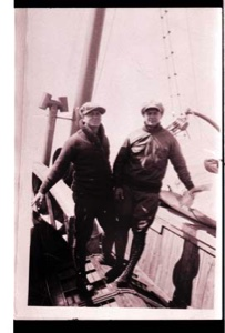 Image: Two men aboard ship