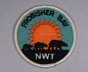 Image of embroidered cloth patch, Frobisher Bay, NWT, with polar bears and sun