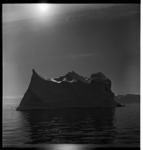 Image: Iceberg, sun and reflectioms