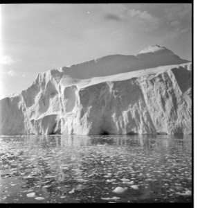Image: Iceberg close by, many small ice floes