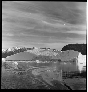 Image of Large iceberg, reflection and wake action