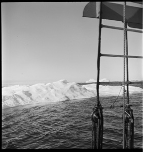 Image: Dying iceberg seen through rigging